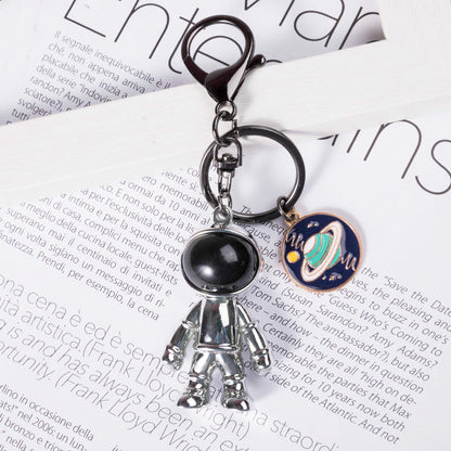 chrome astronaut keychain