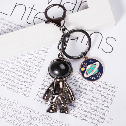 chrome astronaut keychain